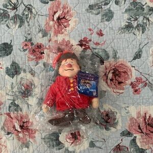 Red and Brown Action Figure